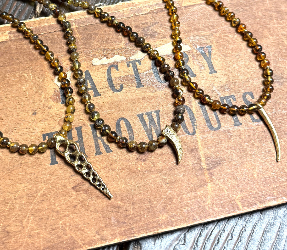 Amber Beaded Necklace With Gold Cast Pendant